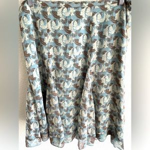 A line flared skirt 100% silk with polyester lining, almost new condition